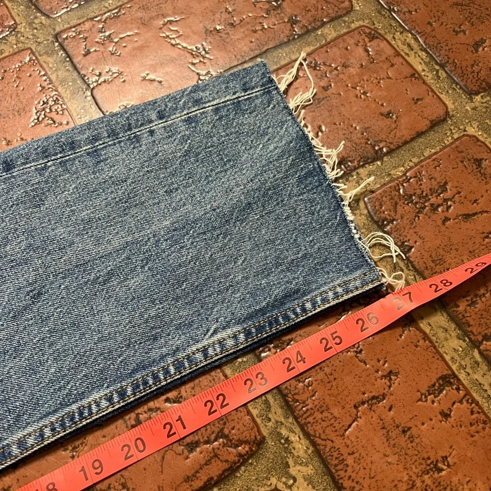 Re Done high rise stove pipe raw frayed hem denim jeans